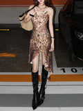 Unleash your wild side with this stunning leopard print camisole dress that effortlessly transitions from casual hangouts to evening soirées. The asymmetrical hem adds an unexpected twist, creating movement and visual interest with every step. Silky smooth fabric drapes beautifully against your skin, while the camisole neckline keeps things chic and sophisticated. Perfect for those moments when you want to look put-together without trying too hard—this dress is your new go-to for turning heads and feeling f
