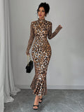 Upgrade your autumn and winter wardrobe with our Elegant Leopard Print Mermaid Dress. Its unique design and trendy print will make you stand out from the crowd. Made with high-quality materials, this dress is perfect for both formal and casual occasions. Stay elegant and fashionable all season long.