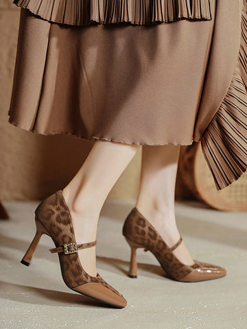 Step out in style with these playful leopard print satin stilettos! Featuring a sleek high heel and an adjustable buckle strap, these Mary Jane pumps add a fun, fierce touch to your spring wardrobe. Perfect for turning heads and dancing the night away, they combine comfort with bold fashion flair.