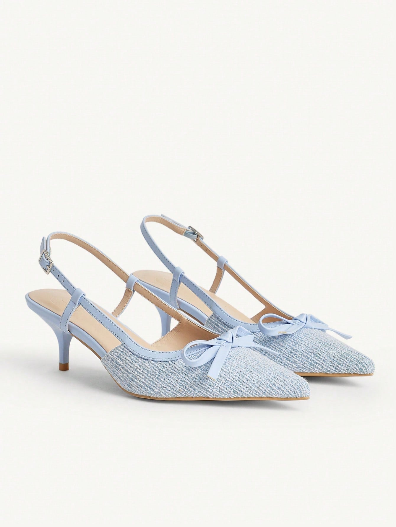 Step into style with our Elegant Light Blue Bow Pointed Toe Kitten Heel Mule Sandals, perfect for tea time and dates! With a playful bow and comfortable kitten heel, you'll be the talk of the town. The perfect combination of sophistication and fun.
