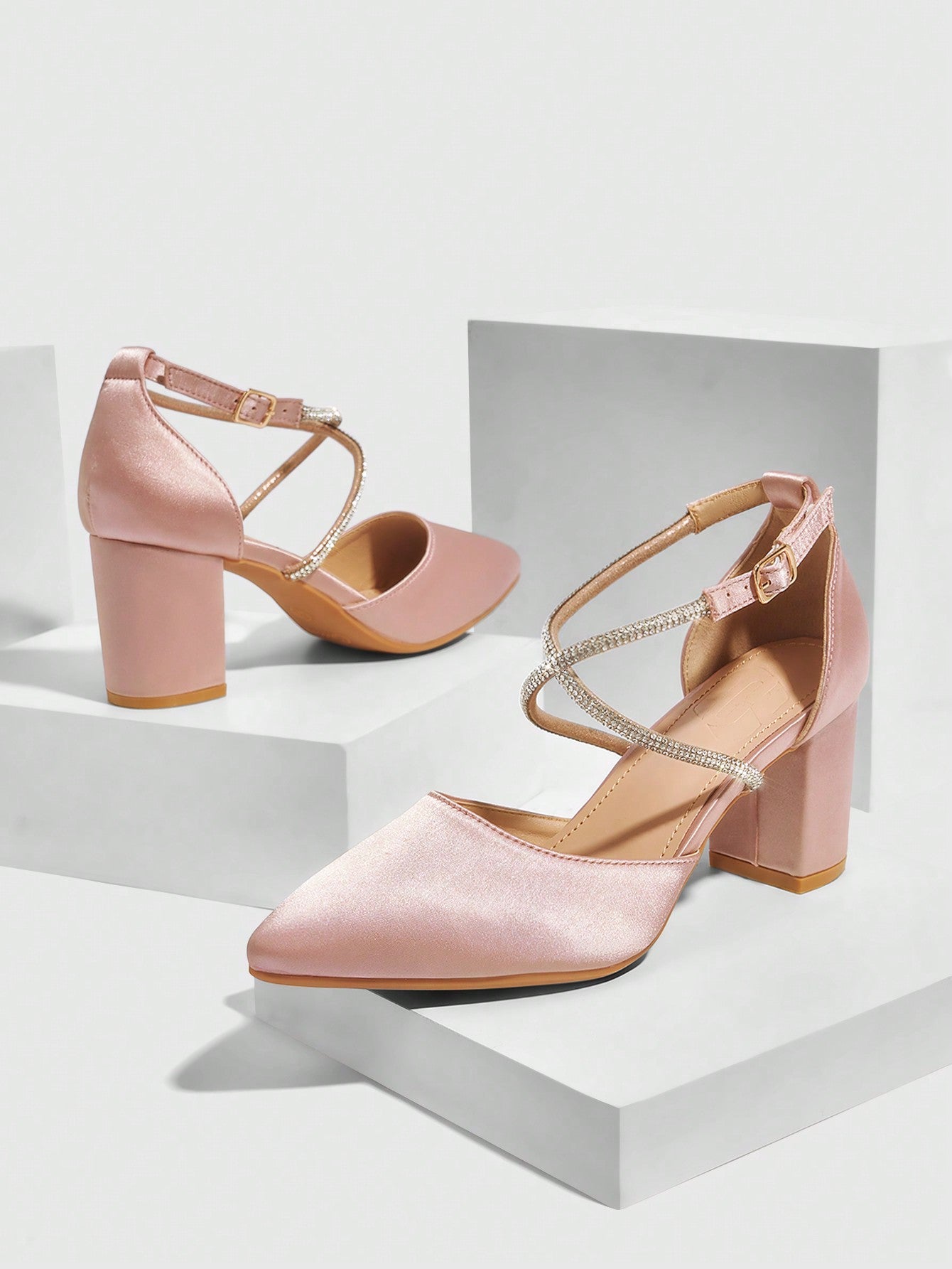 These elegant light pink high heels are perfect for any occasion, from dates and parties to weddings. Made with high-quality materials, they provide both style and comfort. With a classic design and versatile color, they are sure to elevate any outfit. Look and feel your best with these beautiful heels.