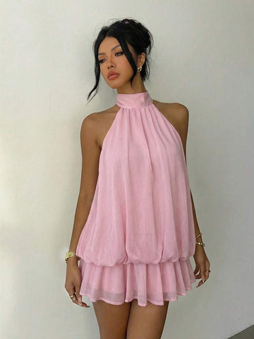 Effortless elegance meets playful charm in this light yellow halter tie mini dress. The adjustable halter neckline flatters every frame while the tie detail adds a touch of sophistication. Perfect for warm-weather outings, casual dates, or weekend adventures, this dress transitions seamlessly from day to night. The soft, breathable fabric keeps you comfortable all day long, while the flattering mini length showcases your style. A versatile wardrobe essential that pairs beautifully with sandals, sneakers, or
