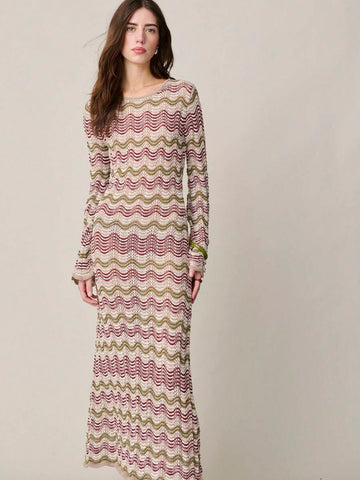 Elevate your wardrobe with this sophisticated midi knit dress, designed for effortless elegance. Featuring a classic round neckline, extra-long sleeves, and a gracefully flared hem with subtle slits, this piece transitions seamlessly from casual outings to special occasions. The all-over print and rib-knit detailing add visual interest, while the natural waistline flatters your silhouette. Crafted from 100% polyester knitwear with a semi-sheer finish, it's perfect for spring and summer celebrations. Ideal f