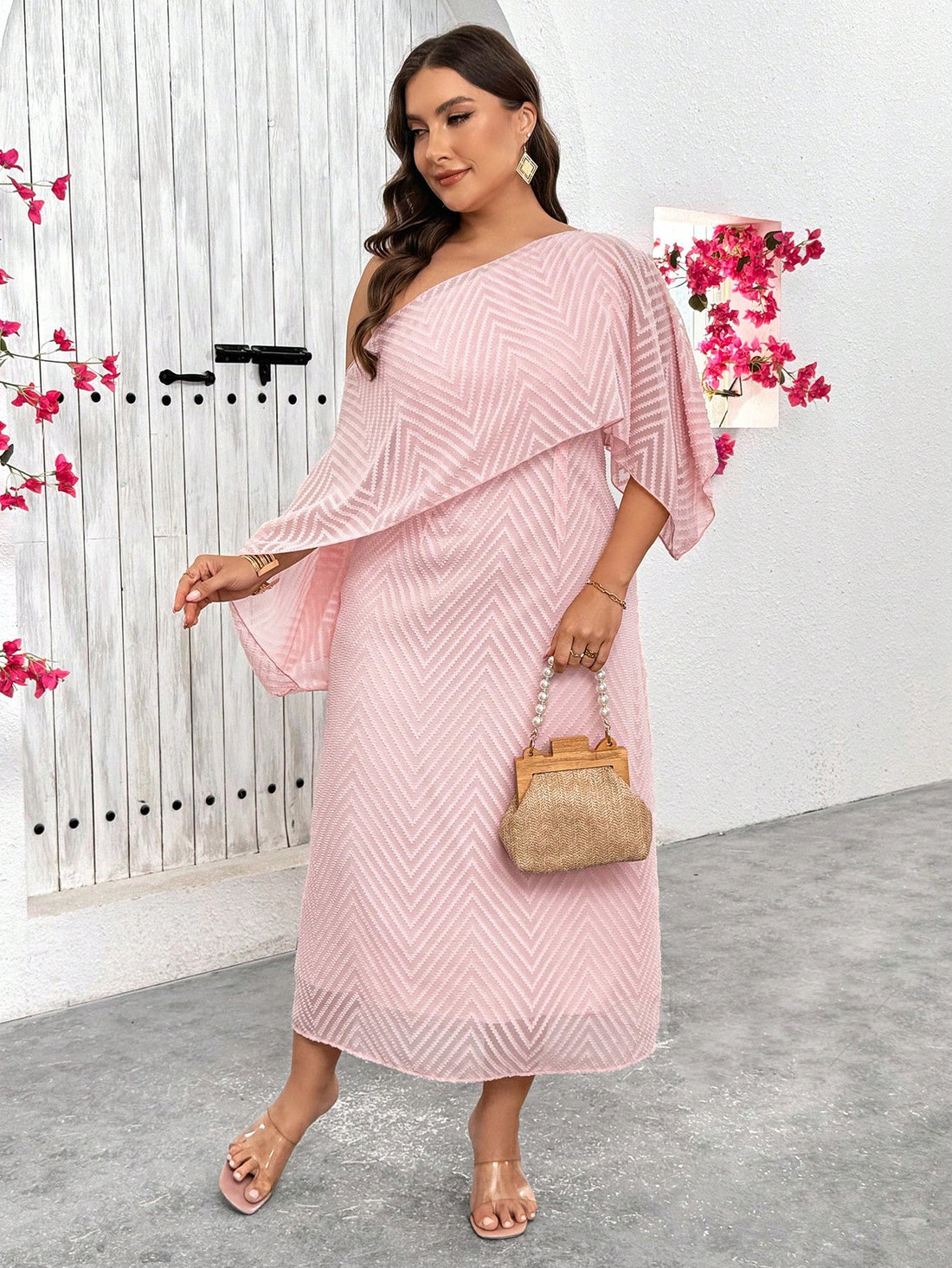 Step into a swirl of elegance with this long chiffon jacquard midi dress designed especially for plus size beauties. Flowing and flattering, it dances with every move—ideal for lively parties or charming strolls through French streets. Embrace comfort and style effortlessly, making every moment feel like a stylish getaway.