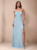 Slip into effortless elegance with this stunning maxi halter dress that's ready to turn heads at any celebration. The flowing silhouette drapes beautifully while the halter neckline offers a flattering, sophisticated touch. Whether you're walking down the aisle as a bridesmaid or dancing under the stars at a summer wedding, this versatile piece transitions seamlessly from ceremony to celebration. The lightweight fabric keeps you cool and comfortable all day long, while the timeless design ensures you'll rea