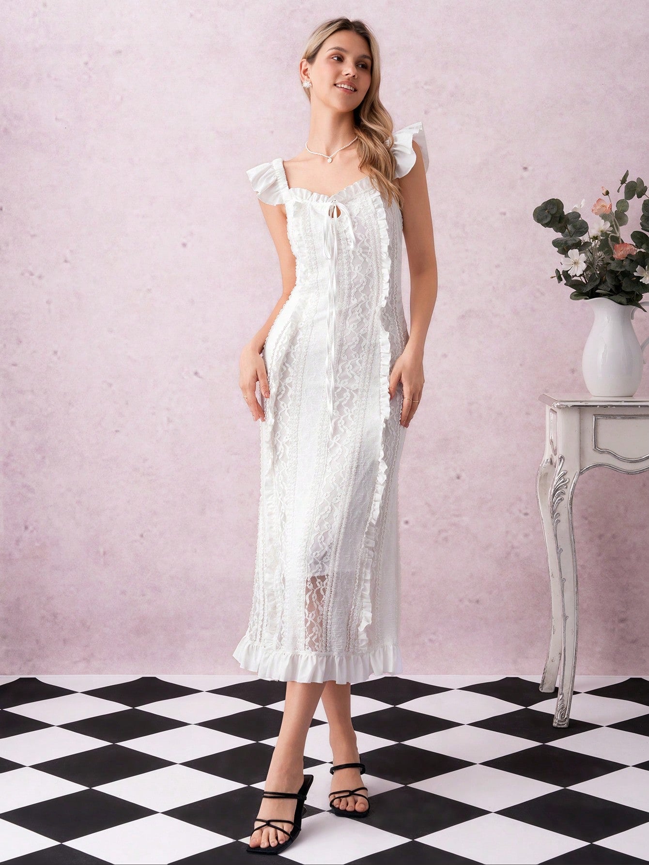 Step out in style with this Elegant Long Ruffled Strap Dress crafted from delicate lace fabric. The flowing ruffles add a flirty touch while the long silhouette ensures you turn heads at any event. Whether it’s a garden party or a romantic dinner, this dress brings effortless charm and a playful vibe to your wardrobe.