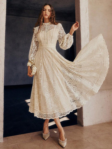Twirl into the spotlight in this stunning long sleeve lace dress that's basically made for making an entrance. The delicate lace detailing catches every light while the flared hem adds that perfect swish-and-sway factor. Whether you're heading to an evening soirée, celebrating with friends, or marking a special moment, this dress delivers elegance with a fun-loving spirit. The long sleeves keep things sophisticated while the flowing silhouette ensures you'll feel as fabulous as you look. Your go-to dress fo