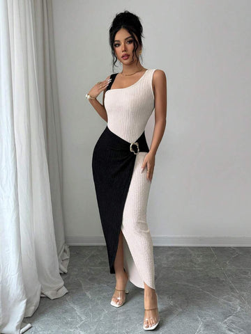 This Elegant Luxury Colorblock One-Shoulder Midi Dress features a bold contrast design and a daring side opening to ensure you make a striking impression. The sophisticated asymmetrical neckline and vibrant color panels offer a high-end look that is perfect for summer weddings, upscale rooftop parties, or formal cocktail evenings.