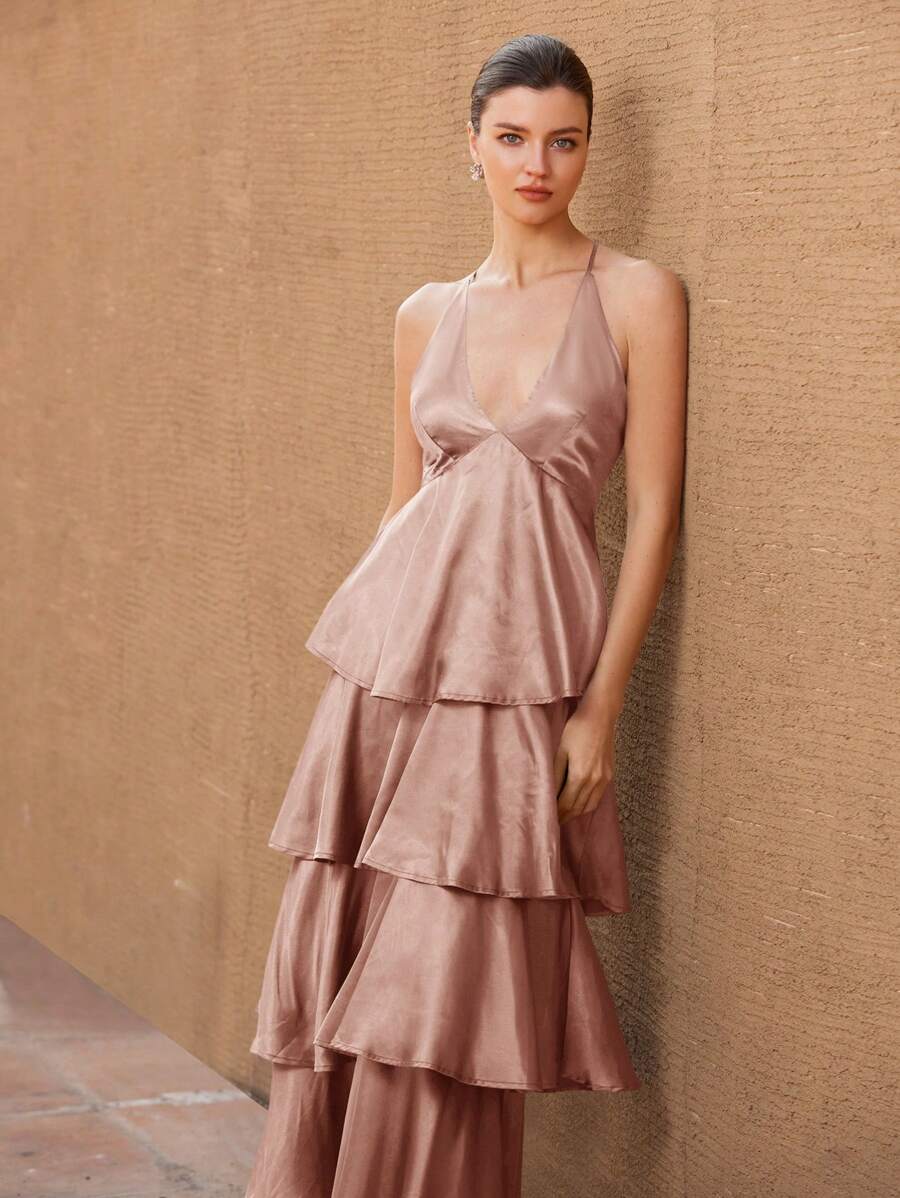 Step into the spotlight with this Elegant Maxi Dress, where French romance meets playful charm. Featuring delicate ruffles and slender spaghetti straps, it’s designed to flow gracefully through your evening adventures. Perfect for twirling under the stars or making a memorable entrance, this dress combines timeless elegance with a flirty twist. Embrace your inner Parisian and let every moment feel like a celebration.