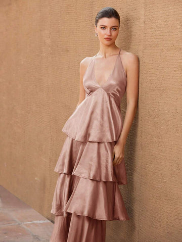 Step into the spotlight with this Elegant Maxi Dress, where French romance meets playful charm. Featuring delicate ruffles and slender spaghetti straps, it’s designed to flow gracefully through your evening adventures. Perfect for twirling under the stars or making a memorable entrance, this dress combines timeless elegance with a flirty twist. Embrace your inner Parisian and let every moment feel like a celebration.