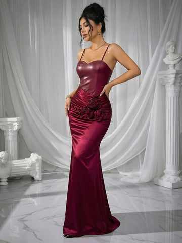 Elevate your evening wardrobe with this sophisticated mermaid hem dress, designed for the modern woman who appreciates refined silhouettes. The sleeveless camisole cut offers a graceful neckline, while strategic patchwork detailing adds visual interest and contemporary flair. The fitted bodice contours beautifully before flowing into a dramatic mermaid skirt that commands attention. Crafted for occasions where elegance matters, this dress transitions seamlessly from cocktail events to upscale dinners. The c