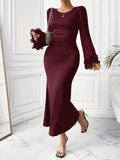 Make a splash at formal parties with this Elegant Mermaid Hem Long Sleeve Dress. The flounce adds a touch of playfulness to this sophisticated piece. Be the envy of the event in this stunning dress!
