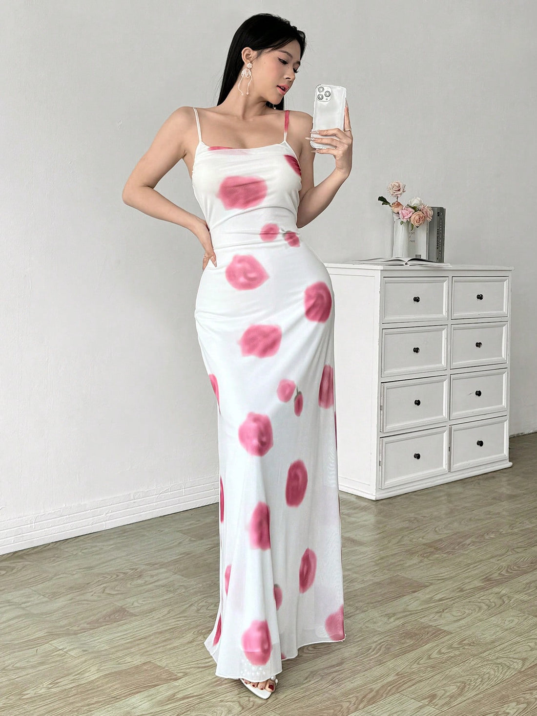 Unleash your inner vixen with our Elegant Mesh Printed Ruffle Spaghetti Strap Dress. Turn heads in this sexy and stylish night out look, featuring a unique printed mesh design and flirty ruffle details. Perfect for a statement-making entrance without taking yourself too seriously.