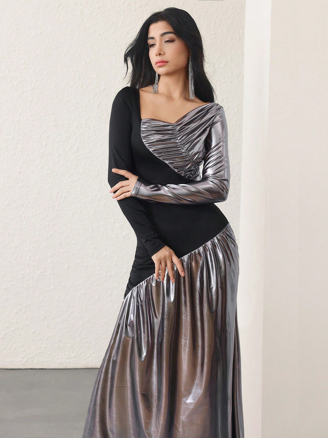 Get ready to turn heads with our Elegant Metallic Bodycon Knit Dress! Perfect for any fashion-forward woman, this dress boasts a stylish long splice design that adds a touch of uniqueness to your outfit. Made with a bodycon knit, this dress hugs your curves in all the right places, giving you a stunning silhouette. Elevate your style game with this statement-making dress!