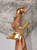 Step out in style with these Elegant Metallic Gold High Heel Party Sandals. Featuring a chic square toe design, they offer a trendy twist on classic glamour. Perfectly suited for outdoor events, their shimmering gold finish adds a fun, radiant touch to any outfit. Dance the night away with the confident flair only these dazzling heels can deliver!