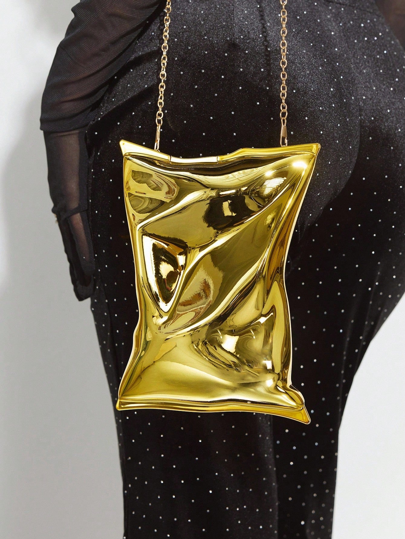 Shine bright all night with this Elegant Metallic Party Clutch Bag! Perfect for adding a sparkling touch to your outfit, this chic accessory holds your essentials while keeping your style on point. Whether you're dancing or sipping cocktails, this clutch is your glamorous sidekick for unforgettable nights.