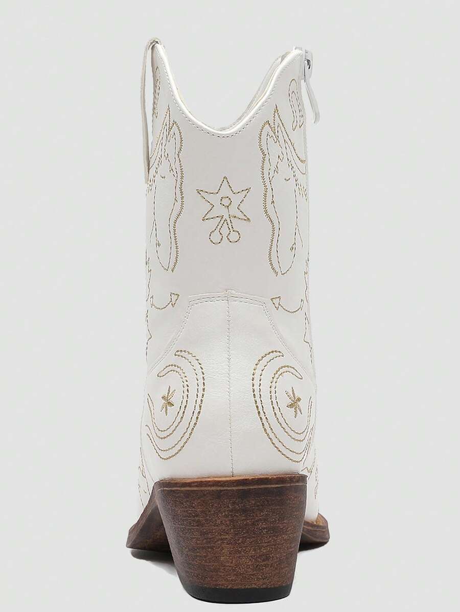 Step into style with these elegant mid-calf western cowboy boots designed just for women. Featuring charming floral embroidery and a sturdy chunky heel, they bring a playful twist to classic cowboy flair. Perfect for adding a bold, feminine touch to any outfit while keeping you comfortable and confident all day long.