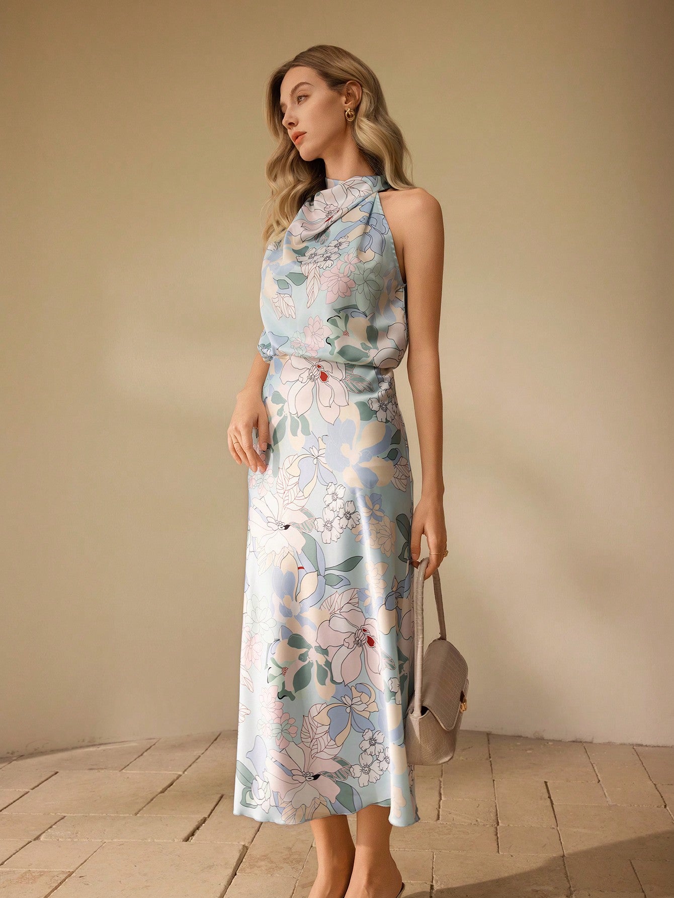 Stay stylish in this elegant mid-length dress featuring a beautiful botanical print. Perfect for any occasion, this dress is sure to turn heads and make you feel confident. Upgrade your wardrobe with this must-have piece.