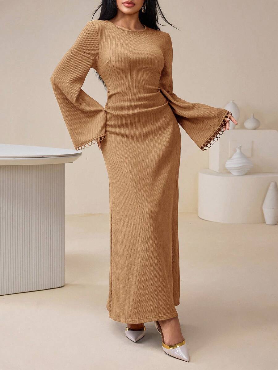 Elevate your everyday wardrobe with this charming midi dress that strikes the perfect balance between polished and fun. The cinched tie-front waist creates a flattering silhouette while the fluttery flare sleeves add a touch of whimsy to your look. Whether you're heading to brunch, running errands, or meeting friends for coffee, this versatile piece transitions seamlessly from day to night. The midi length offers timeless elegance with just enough personality to keep things interesting. Perfect for anyone w