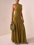 Step into autumn with flair wearing this elegant military green sleeveless long dress. Its rich color and sleek silhouette make it just right for both serious business meetings and lively parties. Feel confident and stylish as you turn heads effortlessly, whether you're sealing deals or dancing the night away.