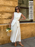 Front View of ivory white sleeveless vest and maxi skirt set for office and daily wear