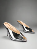 Silver front three-quarter product view of peep-toe stiletto mule sandals with a backless slip-on upper and slim high heel