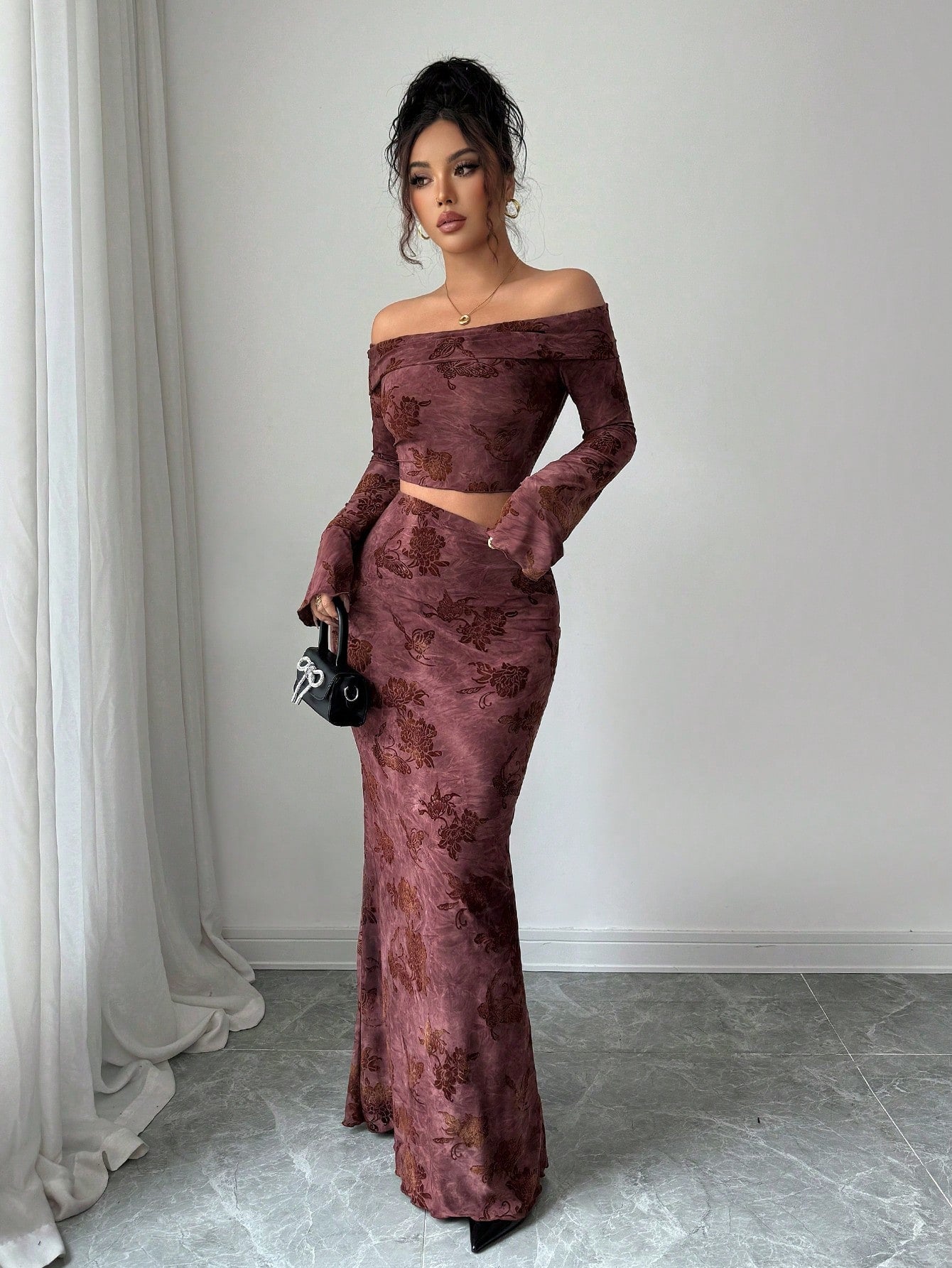 Elevate your party season with this stunning two-piece velvet jacquard set that whispers sophistication without shouting about it. The luxurious fabric drapes beautifully, catching light in all the right ways, while the minimalist design keeps things chic and timeless. Perfect for autumn galas, winter celebrations, or anywhere you want to feel effortlessly elegant. Mix, match, or wear together—this outfit adapts to your vibe as easily as you slip it on. Because sometimes less really is more, especially when