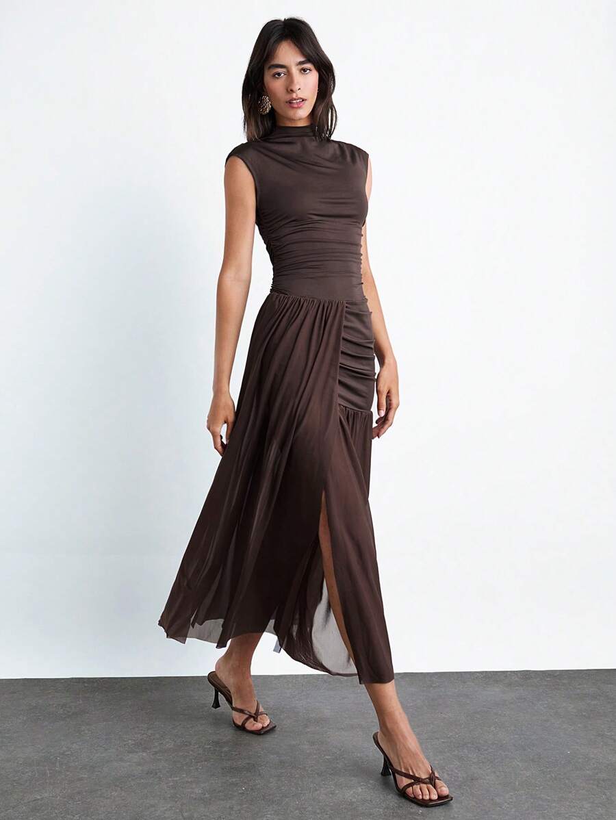 Step into elegance with this mocha brown off-shoulder dress that dances with layered mesh for a flirty, feminine touch. Perfectly suited for cozy autumn and winter days or your next special occasion, it combines warmth with style. Show off your shoulders while enjoying the lightweight comfort of breathable mesh layers that add movement and charm to every step. Whether you're sipping pumpkin spice or dazzling under winter lights, this dress brings playful sophistication to your wardrobe.