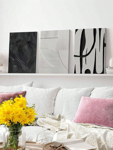 Bring a splash of sleek sophistication to your space with this Elegant Monochrome Abstract Texture Wall Art Set. These minimalist canvas prints blend subtle textures and shades of black and white, creating a stylish backdrop that’s as playful as it is polished. Perfect for adding a modern twist to any room, they effortlessly elevate your home decor without overwhelming your vibe. Let your walls do the talking with this chic, artful ensemble!