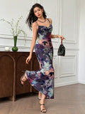 Step into the spotlight with this Elegant Multicolor Floral Maxi Dress. Featuring delicate spaghetti straps and a trendy asymmetrical hem, it’s perfect for turning heads at any special occasion. The vibrant floral pattern adds a playful touch, while the flowing maxi length ensures you dance through the night in comfort and style. Make every moment unforgettable with this charming dress designed to brighten your wardrobe.