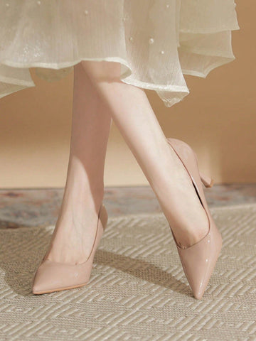 Step into spring with confidence in these stunning nude patent leather pumps. Their sleek, polished finish catches the light beautifully, making them the perfect companion for boardroom meetings or weekend brunches. The classic high heel silhouette elongates your legs while the neutral shade pairs effortlessly with everything in your wardrobe—from tailored trousers to flowing dresses. Whether you're climbing the corporate ladder or simply elevating your everyday look, these versatile heels deliver timeless 
