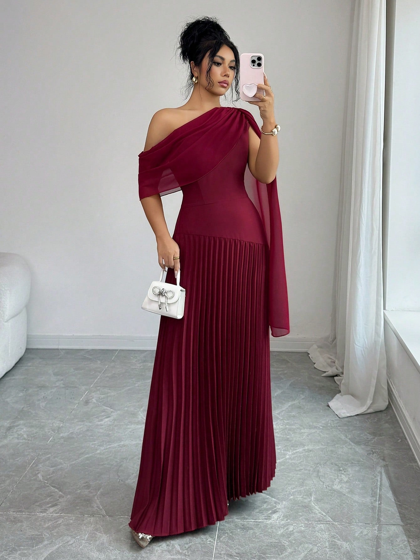 Elevate your evening wardrobe with this sophisticated oblique shoulder dress, designed for the modern woman who appreciates refined elegance. The asymmetrical neckline creates a striking silhouette, while delicate ruffle detailing and pleated construction add dimension and movement. Crafted for versatility, this piece transitions seamlessly from cocktail events to upscale gatherings. The thoughtful design flatters various body types while maintaining a polished, contemporary aesthetic. Perfect for those see