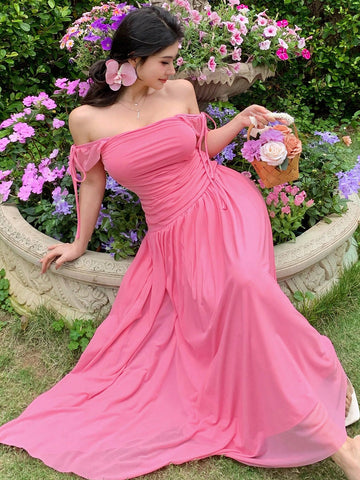 Step into sunshine with this Elegant Off-Shoulder Chiffon Midi Dress, perfect for summer beach holidays. The airy chiffon fabric keeps you cool while the playful off-shoulder style adds a flirty touch. A drawstring waist lets you customize the fit, creating a flattering silhouette that moves with you. Whether you’re strolling the shore or sipping a seaside cocktail, this dress brings effortless charm to your sunny adventures.