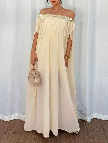 Flaunt your style with this elegant and playful off-shoulder chiffon dress. The flowy design and see-through fabric add a touch of grace and allure, making it perfect for any occasion. Sparkle and shine in this dress that's perfect for those who don't take themselves too seriously.