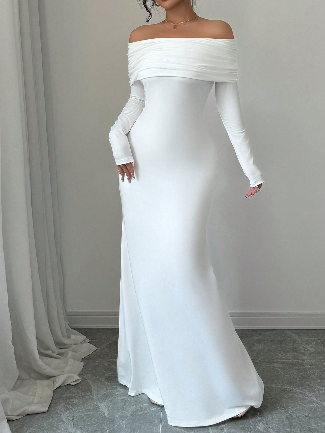 Turn heads this season in our stunning off-shoulder fishtail maxi dress—where elegance meets effortless glamour. The graceful off-shoulder neckline flatters your silhouette while the dramatic fishtail hem adds a touch of sophisticated flair. Crafted for autumn and winter wear, this dress transitions seamlessly from evening events to special occasions. The flowing fabric drapes beautifully, creating a romantic silhouette that celebrates your style. Whether you're dressing up for a night out or making a state