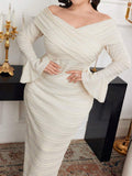 Turn heads with this elegant off-shoulder plus size dress, perfect for evenings that call for a little extra flair. Its dramatic flare sleeves and flowing silhouette bring a playful yet sophisticated vibe, while the solid color keeps it sleek and versatile. Whether it’s a gala or a special night out, this long gown combines comfort with style for a confident, radiant look.