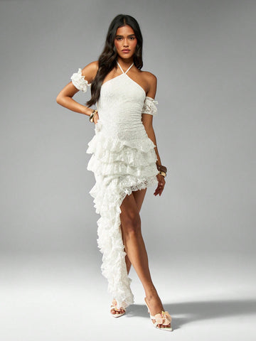 Say "I do" to effortless elegance! This stunning off-shoulder lace wedding dress features a dreamy asymmetric waterfall train that flows with every step, paired with playful ruffled tiers that add movement and dimension. The delicate lace detailing creates an enchanting silhouette perfect for walking down the aisle or celebrating at your bridal shower and reception. Whether you're the bride or the guest of honor, this dress delivers show-stopping style with a touch of whimsy. Make your special moment unforg