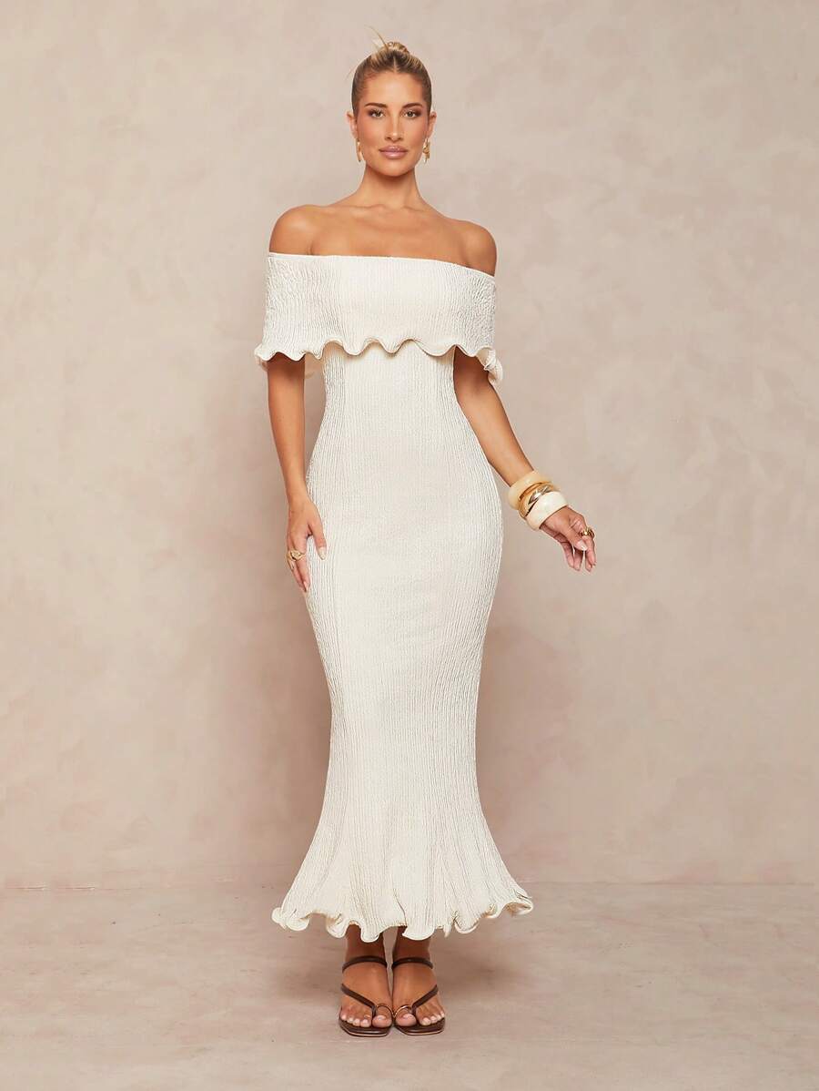Turn heads effortlessly in this Elegant Off-Shoulder Mermaid Tail Bodycon Knit Dress. Designed to hug your curves and flare gracefully at the hem, it combines sophistication with a touch of fun. The off-shoulder style adds a flirty twist, while the soft knit fabric ensures comfort all day and night. Perfect for parties, date nights, or whenever you want to feel fabulous and playful.