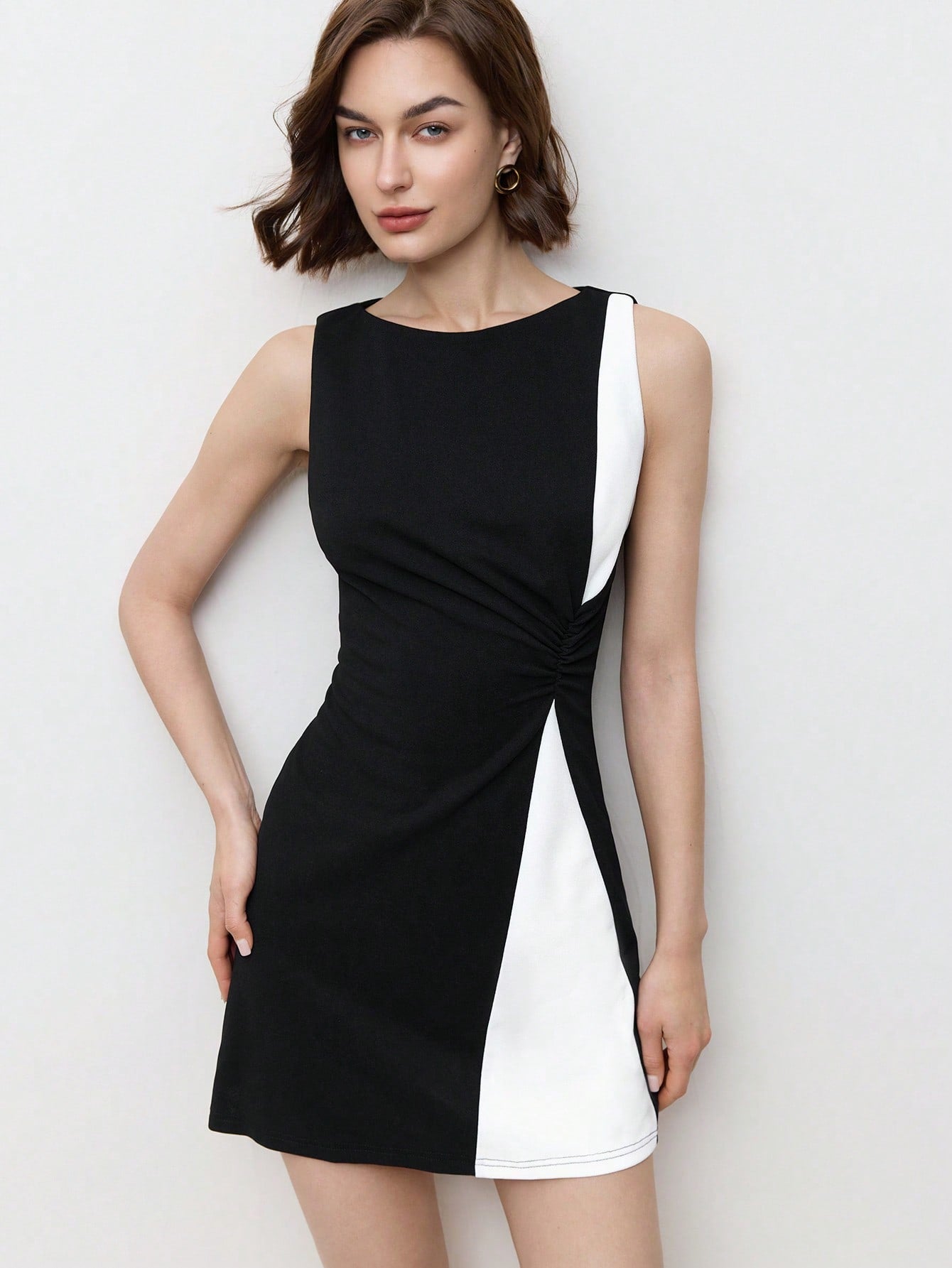 Step out in style with this playful off-shoulder monochrome mini dress, designed to turn heads on your spring and summer dates. Its chic silhouette highlights your shoulders while the crisp monochrome palette keeps it effortlessly cool. Light and flirty, this dress is your go-to for sunny days and warm evenings filled with fun and romance.