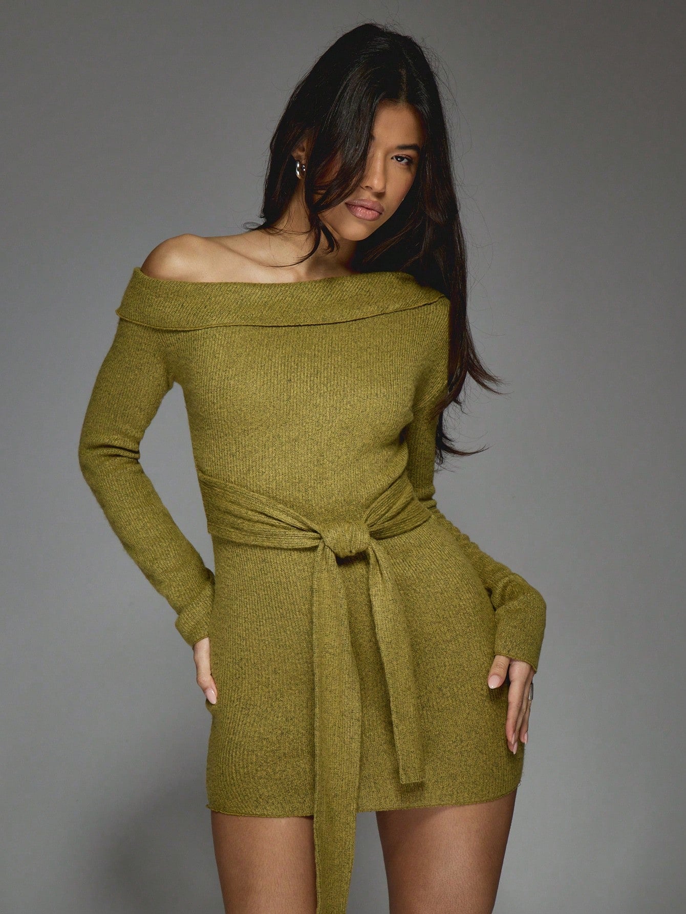 Get ready to celebrate St. Patrick's Day in style with our Elegant Off-Shoulder Ribbed Mini Dress! This dress features a flattering off-shoulder design and a tie waist for the perfect fit. The ribbed texture adds a touch of elegance to this fun and festive dress. Perfect for your St. Patrick's Day celebrations!