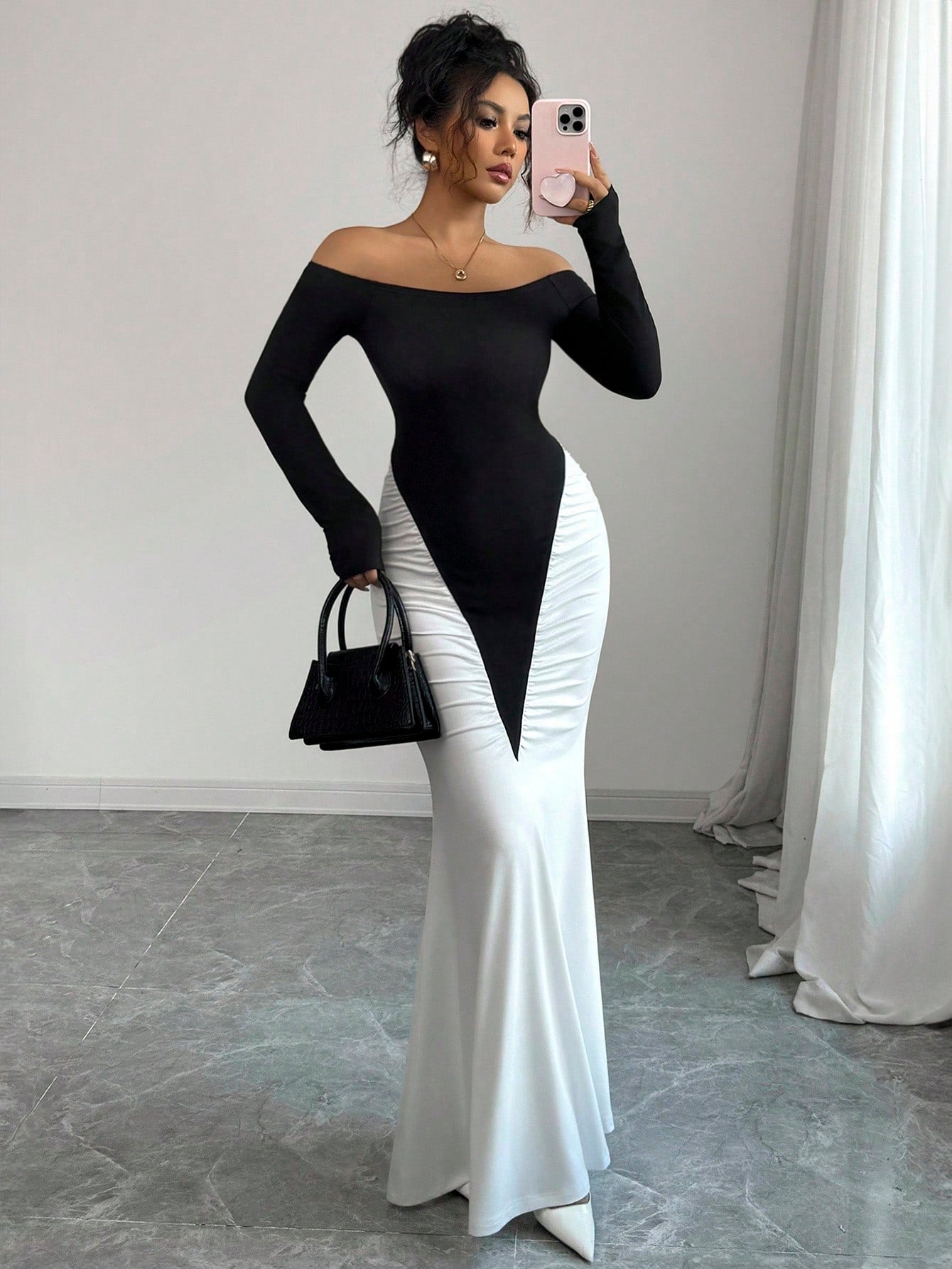 Step into charm with this Elegant Off-Shoulder Ruffle Hem Maxi Dress in striking black and white color blocks. Perfect for spring and autumn dates, its playful off-shoulder design and flirty ruffle hem mix sophistication with fun, keeping you graceful and comfortable all day or night. Embrace the season in style and turn heads wherever you go!