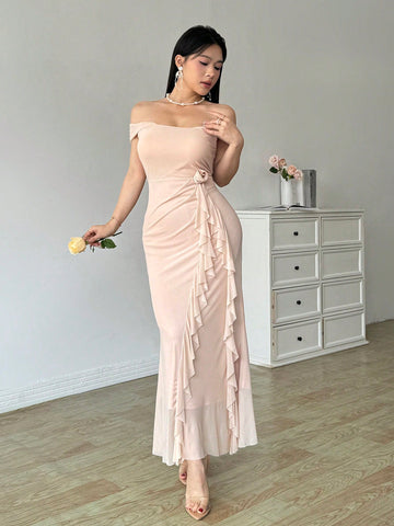 Add some glamour to your wardrobe with our Elegant Off-Shoulder Ruffled Maxi Dress. The stylish ruffled design and solid color mesh create an eye-catching look, while the off-shoulder neckline adds a touch of elegance. Perfect for any special occasion, this dress is sure to turn heads and make a statement.