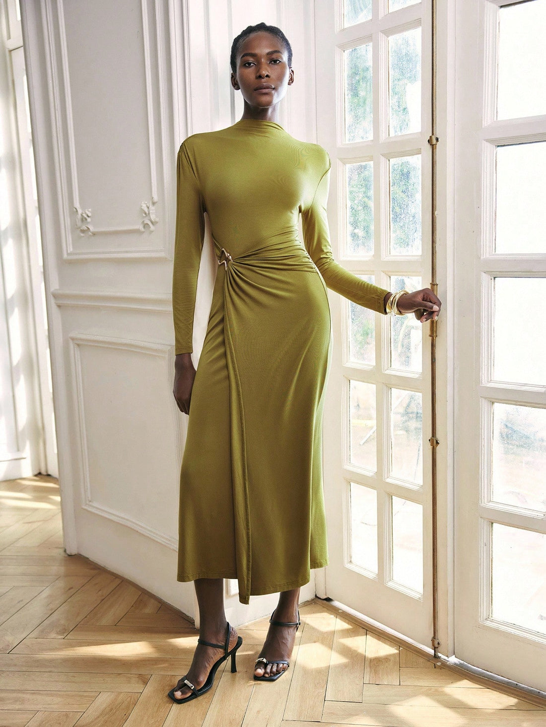 Step into autumn magic with this Elegant Olive Green Long Sleeve Dress, featuring a chic metal ring detail that adds just the right touch of sparkle. Perfect for weddings and special occasions, its flattering silhouette combines comfort with style, making you feel fabulous as you celebrate. This dress is your go-to for turning heads and catching compliments all season long!
