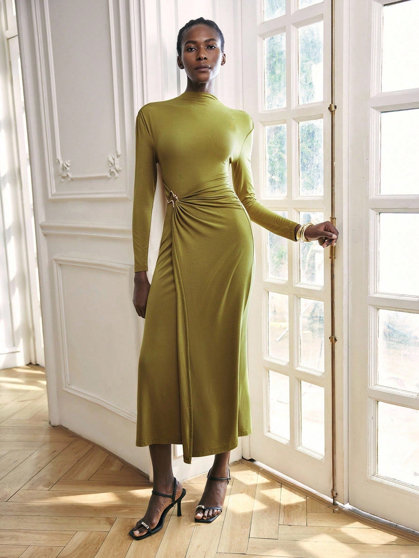 Step into autumn magic with this Elegant Olive Green Long Sleeve Dress, featuring a chic metal ring detail that adds just the right touch of sparkle. Perfect for weddings and special occasions, its flattering silhouette combines comfort with style, making you feel fabulous as you celebrate. This dress is your go-to for turning heads and catching compliments all season long!