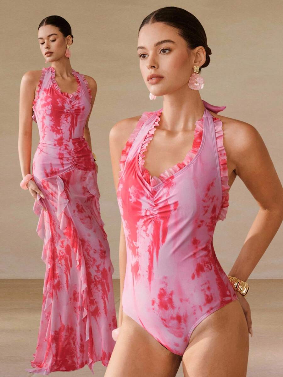 Make a splash this season with our Elegant Ombre Floral Ruffle Strap One-Piece Swimsuit &amp; Skirt Set. Featuring a stunning gradient ombre design paired with delicate floral prints, this two-piece ensemble combines sophistication with playful style. The ruffle strap detailing adds feminine charm, while the coordinating skirt offers versatile coverage for beach days, poolside lounging, or vacation getaways. 