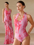 Make a splash this season with our Elegant Ombre Floral Ruffle Strap One-Piece Swimsuit & Skirt Set. Featuring a stunning gradient ombre design paired with delicate floral prints, this two-piece ensemble combines sophistication with playful style. The ruffle strap detailing adds feminine charm, while the coordinating skirt offers versatile coverage for beach days, poolside lounging, or vacation getaways. 