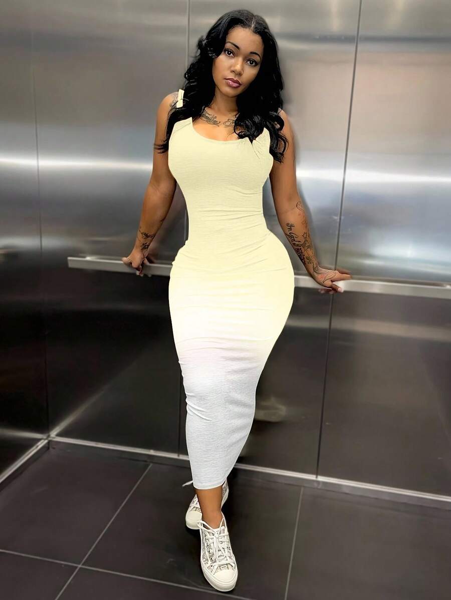 Slip into effortless summer elegance with this stunning ombre maxi dress. The sleek sleeveless silhouette and classic round neckline create a timeless look that transitions seamlessly from day to night. Rich brown tones fade beautifully across the fabric, adding depth and visual interest to your wardrobe. Perfect for beach getaways, garden parties, or casual evening strolls, this dress drapes gracefully and keeps you cool when temperatures rise. A versatile piece that pairs beautifully with sandals, sneaker