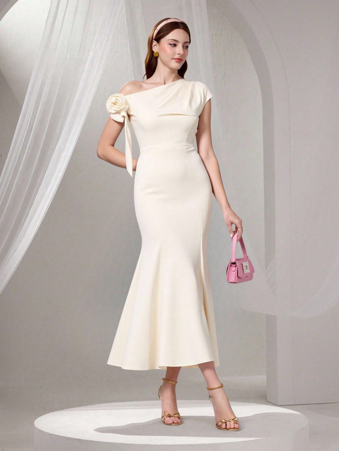 Turn heads at your next event in this stunning one-shoulder midi dress that effortlessly blends sophistication with modern flair. The asymmetric neckline creates an eye-catching silhouette, while the sleek mermaid cut hugs your curves in all the right places. Perfect for cocktail parties, weddings, or any occasion calling for understated elegance, this minimalist design lets you shine without trying too hard. Slip it on and feel the confidence that comes with looking absolutely fabulous.