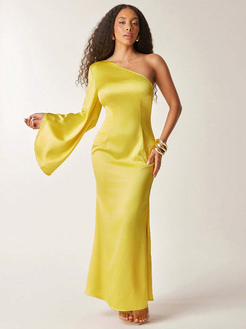 Turn heads this summer in our Elegant One-Shoulder Satin Maxi Dress! Featuring a flattering mermaid hem and whimsical bell sleeves, this dress dances with every step. Perfect for weddings and special events, its silky satin fabric adds a touch of luxury while keeping you cool and comfortable. Embrace effortless elegance with a playful twist!