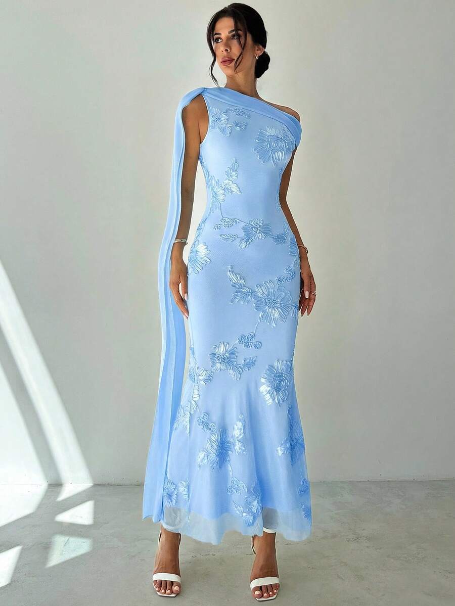 Turn heads at your next special occasion in this stunning one-shoulder yellow mermaid dress. The elegant silhouette features delicate embroidered mesh detailing that adds romance and sophistication to every movement. Perfect for date nights, cocktail parties, and memorable celebrations, this dress combines timeless style with modern flair. The flowing mermaid cut flatters your figure while the soft yellow hue radiates warmth and elegance. An ideal choice for anyone seeking a show-stopping look that feels bo